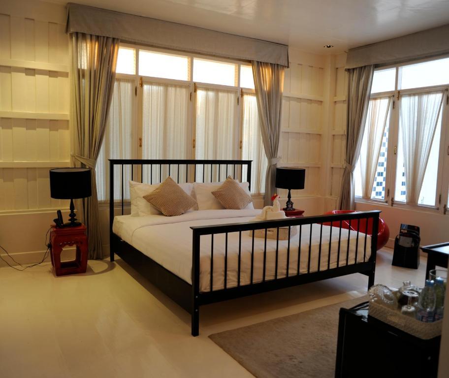 The Hen Hua Hin Hotell Rum bild